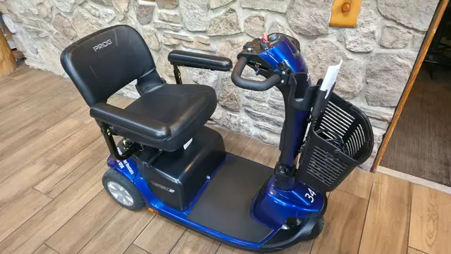 Mobility scooter rental at a blue scooter at stone wall, Kansas City