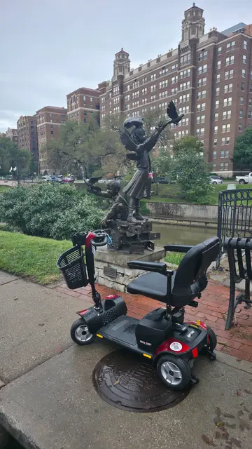 Mobility scooter from KC Mobility at a brush creek sculpture in Kansas City