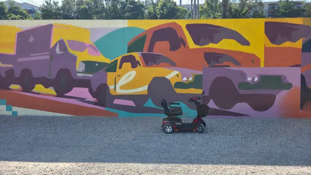 Accessible visit to a car mural with a mobility scooter rental, Kansas City