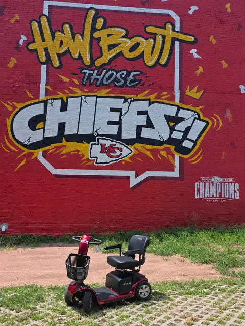 Mobility scooter from KC Mobility at Chiefs championship mural in Kansas City