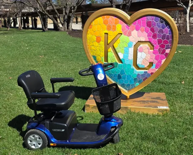 Mobility scooter rental at Colourful KC heart sculpture, Kansas City