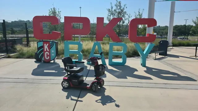 Mobility scooter from KC Mobility at CPKC Baby mural in Kansas City