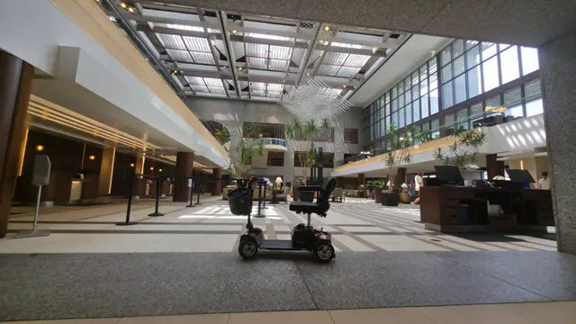 Mobility scooters delivered to a hotel atrium, Kansas City