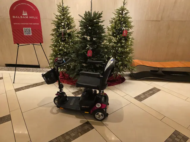 Mobility scooter rental delivered to a hotel lobby at christmas, Kansas City