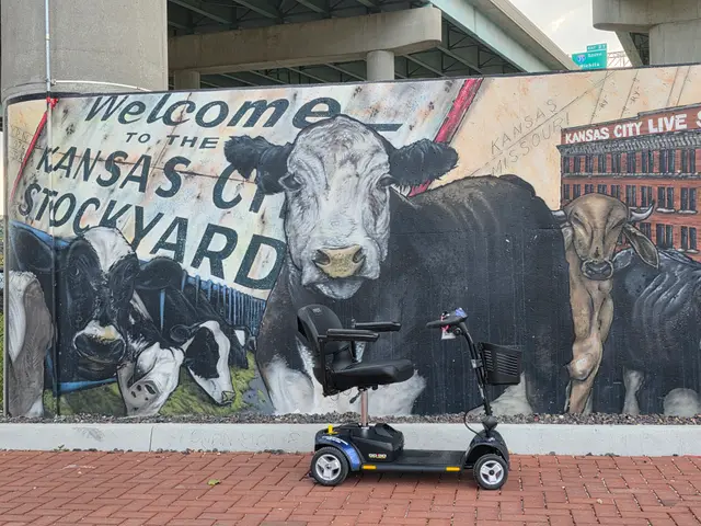 Mobility scooter rental at KC Stockyards welcome mural, Kansas City