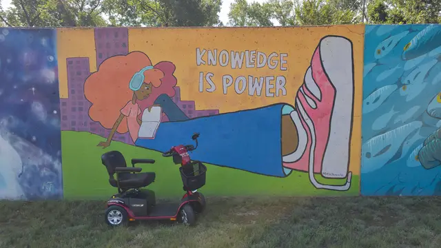 Mobility scooter from KC Mobility at Knowledge Is Power mural in Kansas City
