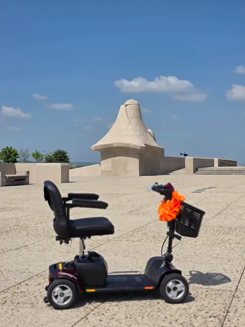 Mobility scooter rental on location at Liberty Memorial sphinx, Kansas City