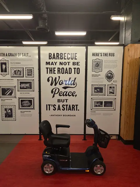 Mobility scooter rental on location at Museum of BBQ quote wall, Kansas City