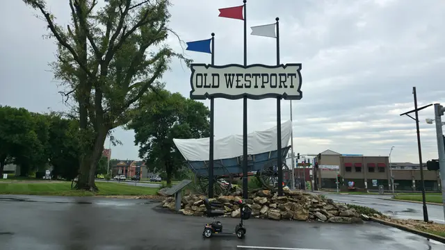 Mobility scooter from KC Mobility at Old Westport sign in Kansas City