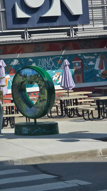 Mobility scooter rental at a painted heart sculpture, Kansas City