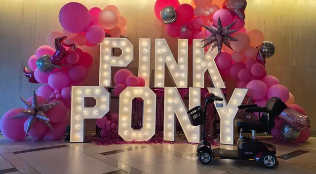 Mobility scooter rental on location at Pink Pony balloon display, Kansas City