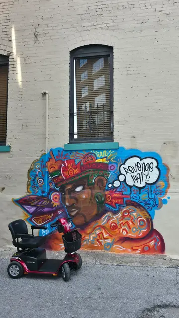 Mobility scooter rental at Revenge Way mural, Kansas City
