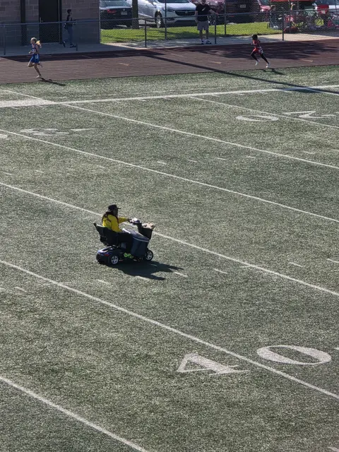 Mobility scooter from KC Mobility at a sports field in Kansas City