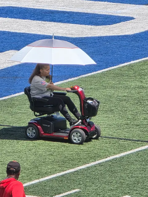 Accessible visit to a sports field with a mobility scooter rental, Kansas City