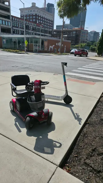 Mobility scooters on location at a streetscape with scooter share, Kansas City