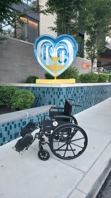 Accessible visit to a tiled water feature with a manual wheelchair rental, Kansas City