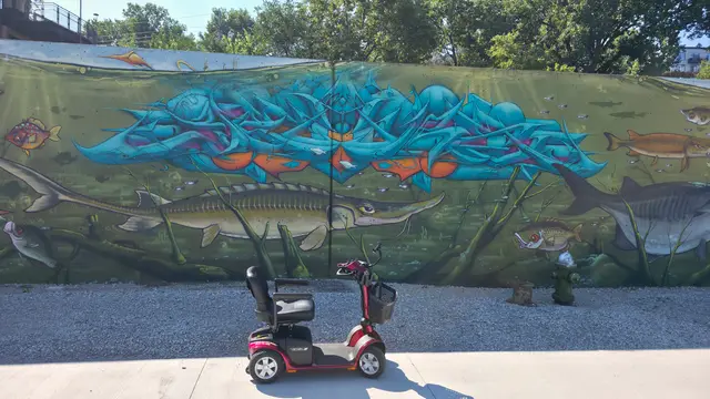Mobility scooter rental on location at an underwater mural, Kansas City
